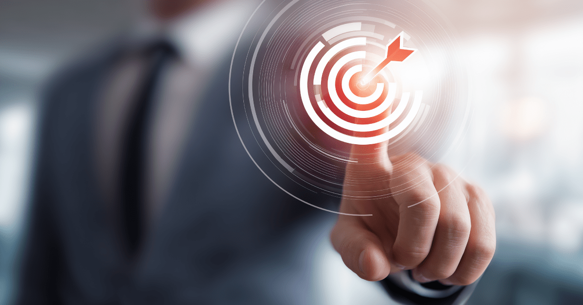 Business professional tapping on a digital target